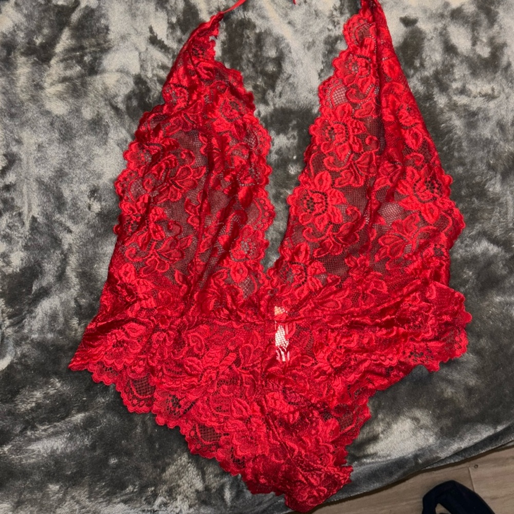Sexy red lingerie. Halter top with plunging neckline and cheeky bottoms. 4xL
